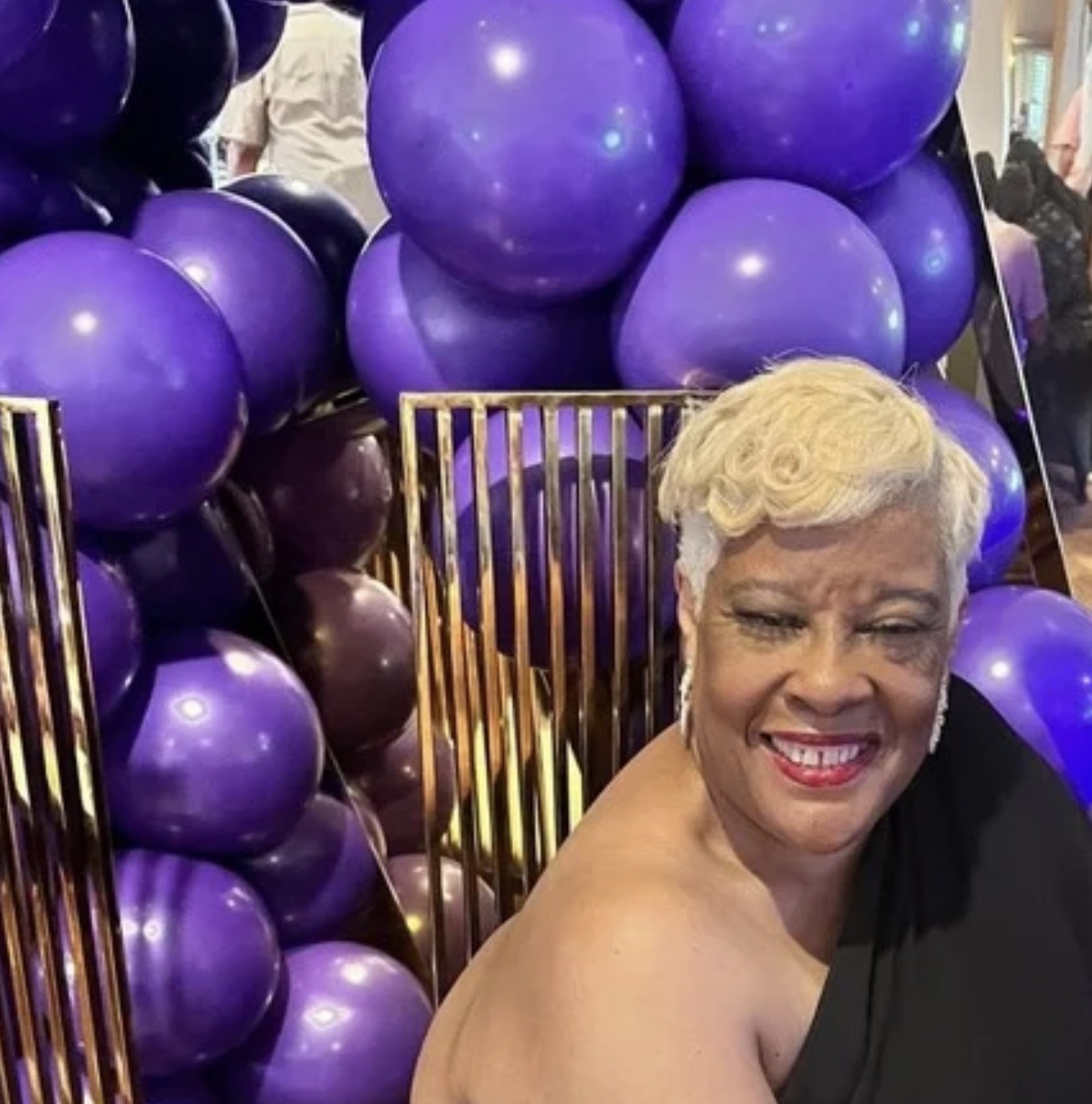Purple balloon garland with gold accents
