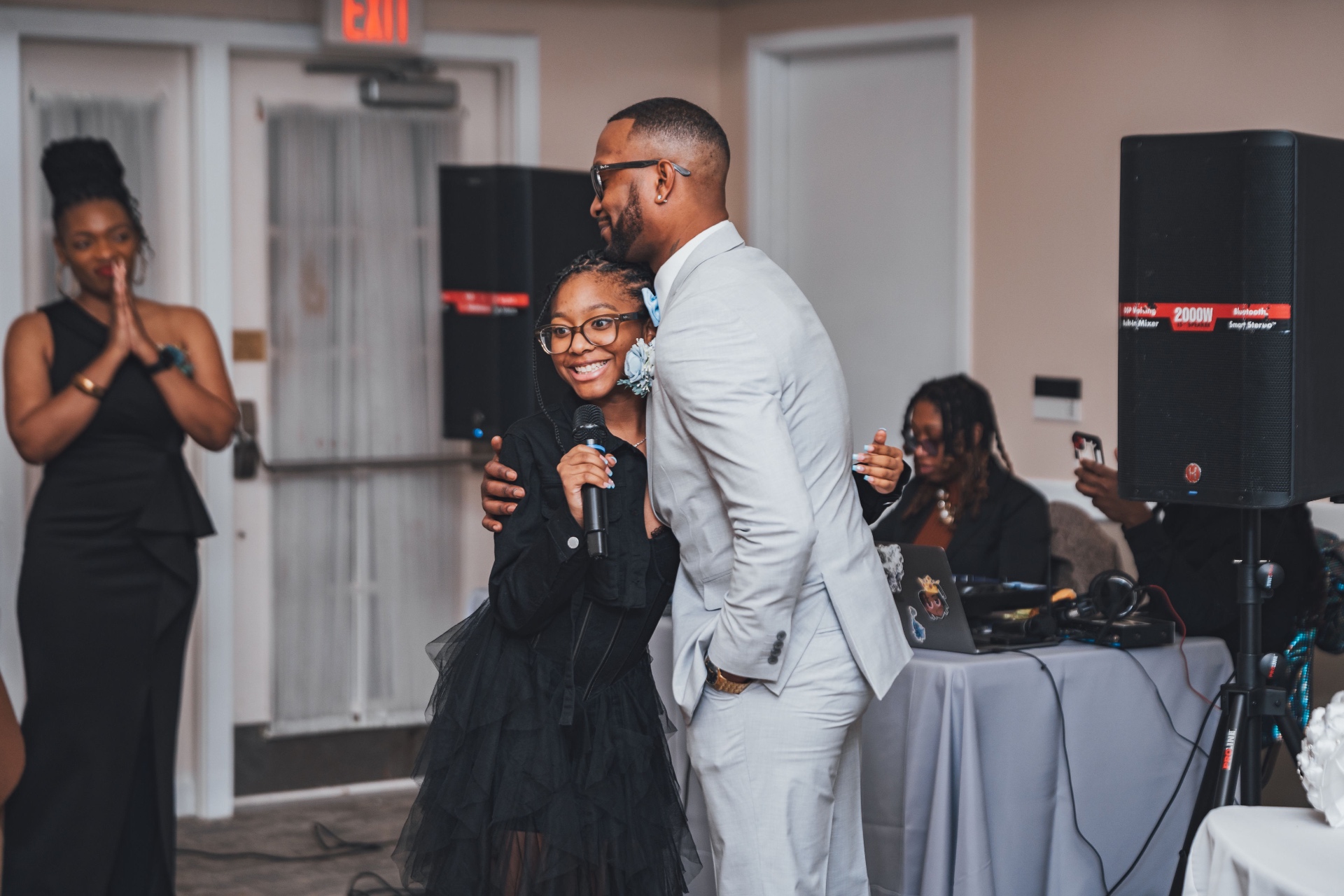 Father-daughter toast moment at reception